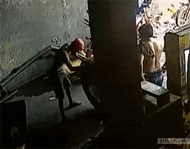 1433522011_guy_wiped_out_by_exploding_tire.gif